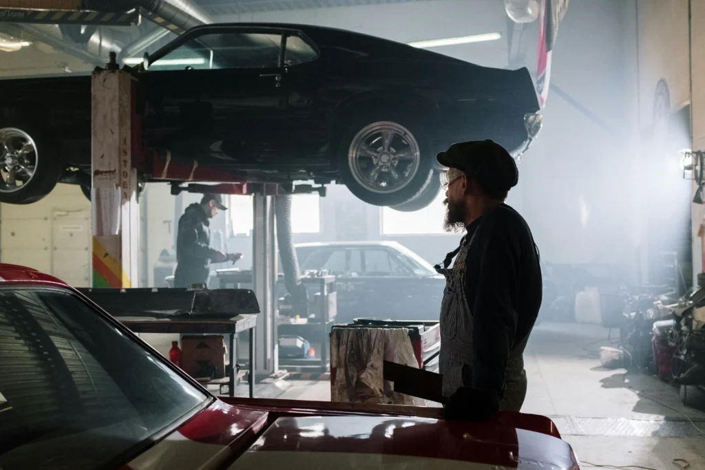 Mechanics working in a garage.