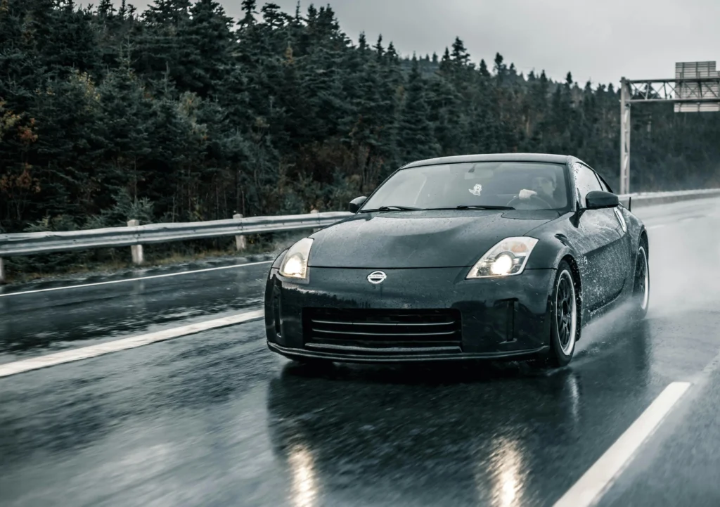 Car driving on a rainy road.