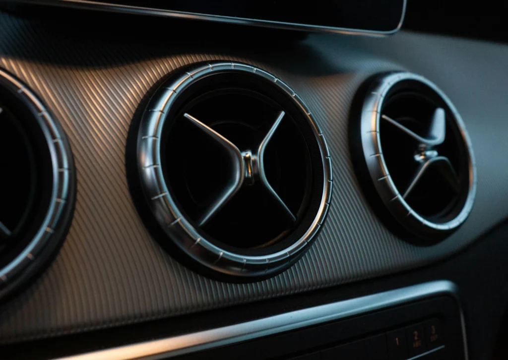 Car air conditioning vents close-up